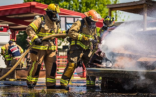 Fire fighters putting water out 